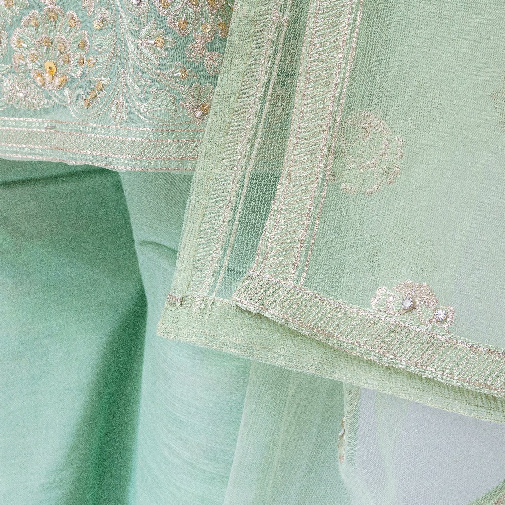 Sophisticated Organza Ensemble: Embroidered Shirt, Raa Silk Trouser, and Hand-Embellished Net Dupatta - A Timeless Trio of Elegance